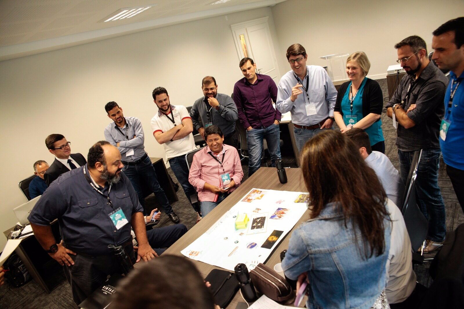 Church planters collaborating around a table at an ACTS gathering